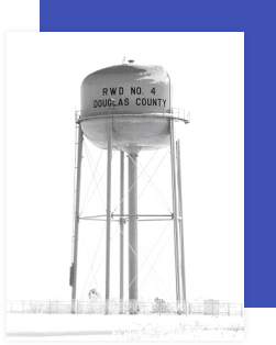 water tower painted white with RWD No 4 Douglas Co painted in black font on front