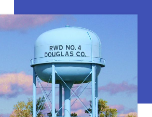 water tower painted light blue with RWD No 4 Douglas Co painted in black font on front